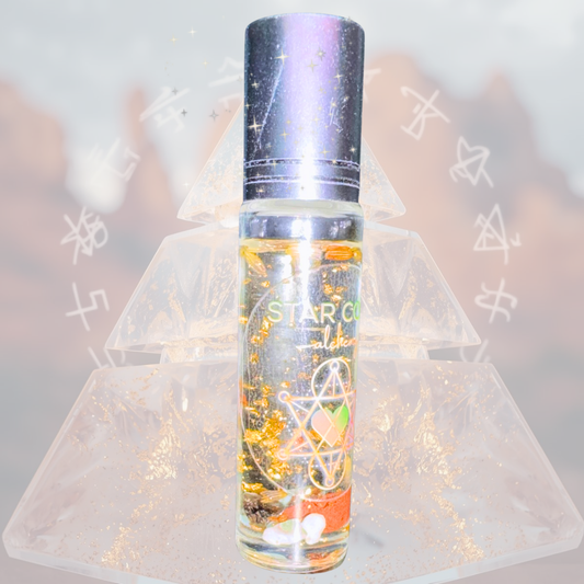 Essential oil roll on bottle with a silver cap Star Code Alchemy.